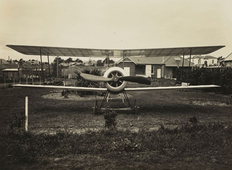 Airports Navigate - grayscale photography of biplane on field