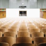 Higher Education Trends - empty chairs in theater