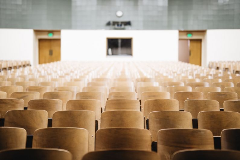 Higher Education Trends - empty chairs in theater