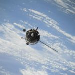 Decluttering Space - satellite flying on space