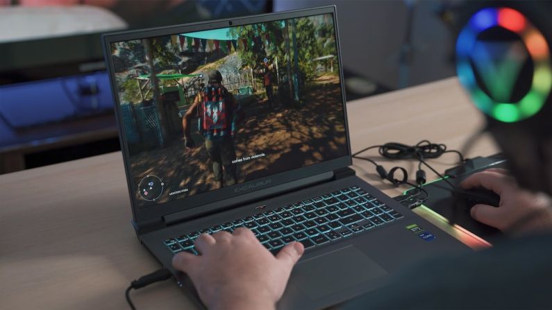 Build PC Tutorial - a person playing a video game on a laptop