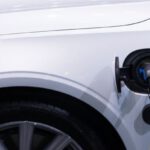 Hybrid Car Benefits - White Car Charging