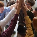 Company Culture - Photo Of People Holding Each Other's Hands