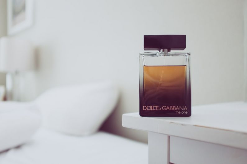 Perfume Selection - Dolce & Gabbana The One fragrance bottle on white wooden table