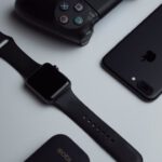 Tech Gadgets - black iPhone 7 Plus and space gray Apple Watch with black sport band